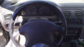 235.su1n98 Subaru Legacy 1998 Steering Wheel 26007474