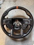 Oem Ford 15-19 F150 Black Leather W/ Orange Steering Wheel Raptor HL3Z3600GA. Fixed Price $425.00.