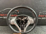 14-16 Nissan Rogue Black Leather Wrapped Steering Wheel. Fixed Price $100.00.