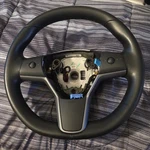 Tesla Black Leather Steering Wheel 1105324-00-H. Fixed Price $199.99.