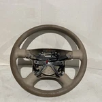 Ford 03-06 Expedition Medium Parchment Tan Vinyl Steering Wheel Only. Fixed Price $99.99.