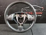 2013 Suzuki SX4 Black Leather Wrapped Steering Wheel With Accessory Controls. Fixed Price $95.00.