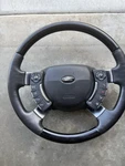 Range Rover L322 Steering Wheel With Black Wood And Leather. Fixed Price $1250.00.