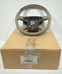 New Oem Genuine Ford Steering Wheel 2004-2007 Freestar Monterey Pebble Leather. Fixed Price $225.00.