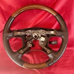 2001-2006 Mitsubishi Montero Limited Steering Wheel Woodgrain Leather Oem. Fixed Price $174.99.