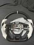 2020-2025 Kia K5 Steering Wheel. Carbon Fiber With Prefotrated Leather Stitch. Fixed Price $250.00.