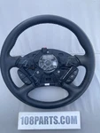2000-2007 Ford Focus Black Leather Stitch Steering Wheel With Cruise Buttons. Fixed Price $99.99.