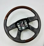 2003-2006 Gm Cadillac Escalade Steering Wheel Wood Grain W/ Vdk Neutral Leather. Fixed Price $88.30.