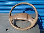 89-95 Toyota Pickup 2 Spoke Steering Wheel Brown Base Dlx. Fixed Price $150.00.