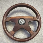 Doral Branded Grant Mahogany Wooden Steering Wheel. Fixed Price $100.00.