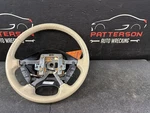 02-05 Ford Thunderbird Tan Leather Wrapped Steering Wheel 5W633F563AAW. Fixed Price $85.00.