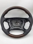 Mercedes Sport Laurelwood & Black Leather Steering Wheel For CLS500 219 Chassis. Fixed Price $1100.00.