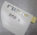 Oem 86311-AT000 Emblem 'niro' Symbol Mark Track# For Kia 2023 2024 SG2. Fixed Price $62.95.