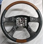 2003-2006 Cadillac Escalade Leather & Wood Grain Steering Wheel Pewter. Fixed Price $89.95.
