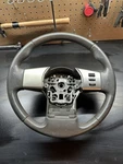 2009 Nissan Frontier King Cab 4X4 Steering Wheel W/ Cruise Control. Fixed Price $100.00.