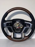 Custom Made Wood Grain Ford F-150 Steering Wheel. Fixed Price $850.00.