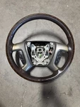 Heated Brown Leather Woodgrain Steering Wheel W/buttons From 2012 Yukon 10990551. Fixed Price $175.00.