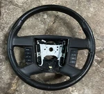 08-11 Ford Escape Black Leather Wrapped Steering Wheel. Fixed Price $39.99.
