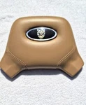 Oem 1991-92 Jaguar XJ6-XJ40 Leather Beige Steering Wheel Center Pad. Fixed Price $31.95.
