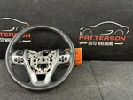 13-18 Ford Taurus Leather Wrapped Steering Wheel Non-heated. Fixed Price $95.00.