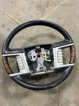 2007-14 Lincoln Navigator Wood Grain Leather Steering Wheel Black. Fixed Price $99.00.