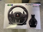 Subsonic Superdrive GS650-X Steering Wheel W/ Manual Shifter 3 Pedals Open Box. Fixed Price $85.00.