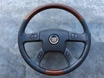 2003-2006 Cadillac Escalade Factory Woodgrain Steering Wheel 03-06 Gm With Horn. Fixed Price $105.00.