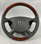 Genuine Wood Steering Wheel With Leather Cover Mercedes W211 Elegance Brand Oem. Fixed Price $1386.47.