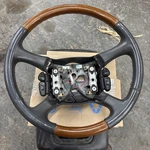 2000-2002 Cadillac Escalade Steering Wheel W/ Switches Leather Woodgrain Oem. Fixed Price $160.00.