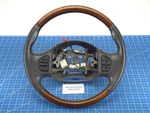 Ford Excursion 99-07 F250 Lincoln Navigator Gray Leather Wood Steering Wheel. Fixed Price $189.99.