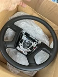 New Gm 22947803 Black Steering Wheel 2007-2014 Silverado Sierra. Fixed Price $165.00.