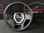 2008 Ford Explorer Black Leather Wrapped Steering Wheel W/ Radio Controls. Fixed Price $125.00.