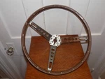 Vintage 1965-66 Ford Mustang Deluxe Wood Grain Steering Wheel. Fixed Price $125.00.