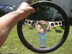 The 500 Superior 12" Chrome Streering Wheel Black Grip Usa. Fixed Price $49.00.