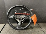 06-08 Mazda Leather Wrapped Steering Wheel With Accessory Control Black. Fixed Price $125.00.