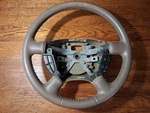 2004-2005 Mercury Mountaineer Ford Explorer Oem Tan Steering Wheel W/ Controls. Fixed Price $80.00.