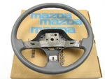 New Genuine Oem Mazda GN52-32-980B 96 Dark Gray Steering Wheel 1990 626. Fixed Price $89.96.