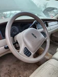 Tan 98-04 Lincoln Town Car Mercury Grand Marquis Leather Steering Wheel. Fixed Price $125.00.