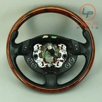 M139 03-13 Maserati Quattroporte Steering Wheel W/ Buttons Black & Wood SW276. Fixed Price $563.99.