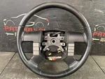 04-08 Ford F150 Black Leather Wrapped Steering Wheel. Fixed Price $100.00.