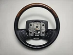 2005 - 2011 Ford Crown Victoria Leather & Wood Steering Wheel (black) 28K Miles. Fixed Price $449.99.