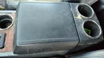 07-08 Ford Expedition Center Console Lid Only Arm Rest Fold Down 1W Black/camel. Fixed Price $77.77.