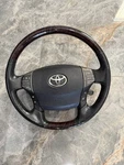 2011-2012 Toyota Avalon Steering Wheel Black Leather W/woodgrain 4510007370C0. Fixed Price $250.00.