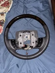 Greystone Lincoln Town Car Wooden Leather Wrapped Steering Wheel 05-11. Fixed Price $150.00.