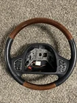 98/02 Lincoln Town Car Steering Wheel Black Leather With Wood. Fixed Price $100.00.