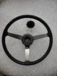 1973 Mazda 808 Three Spoke Steering Wheel. Fixed Price $500.00.