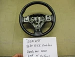 2007-2012 Nissan Versa Leather Steering Wheel W/ Cruise Control Dark Gray. Fixed Price $131.99.