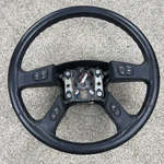 2003-2006 Silverado Sierra Envoy Black Leather Steering Wheel P15188423. Fixed Price $100.00.