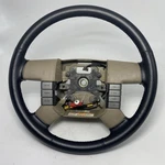 2004-2008 Ford 150 Steering Wheel Leather Cruise & Radio Black Lariat. Fixed Price $89.99.