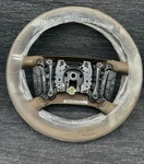 New Oem 2006-2007 Buick Lucerne Cashmere Leather Steering Wheel. Fixed Price $105.99.